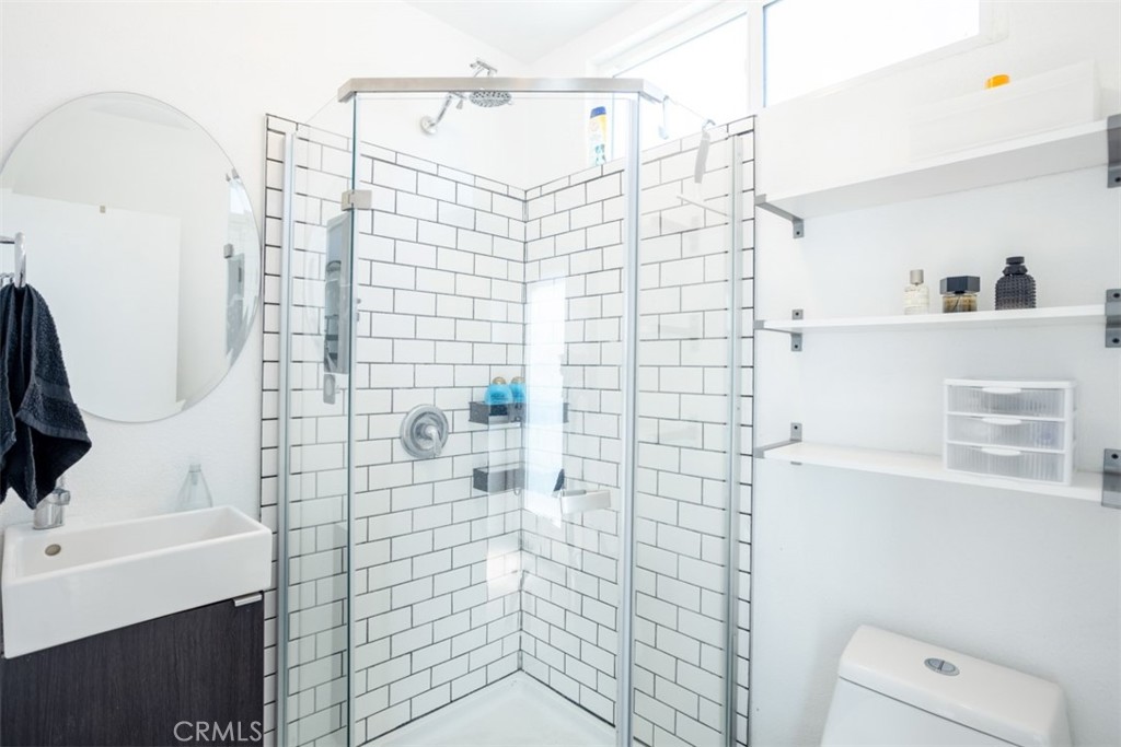 950 El Paso Drive Los Angeles, CA 90042 - Photo 47 of 52 a bathroom with a shower and a sink
