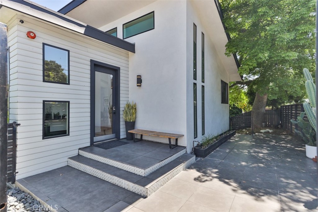 950 El Paso Drive Los Angeles, CA 90042 - Photo 9 of 52 a view of a door with a bench in the patio