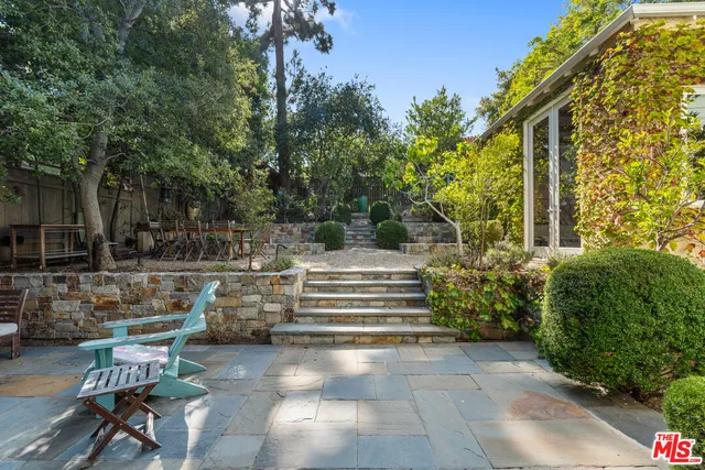 a view of a lounge chairs in the patio
