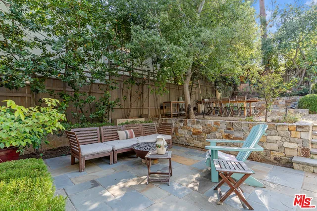 a view of a park with large trees