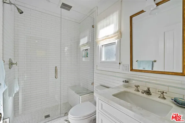 a bedroom with a bed and furniture