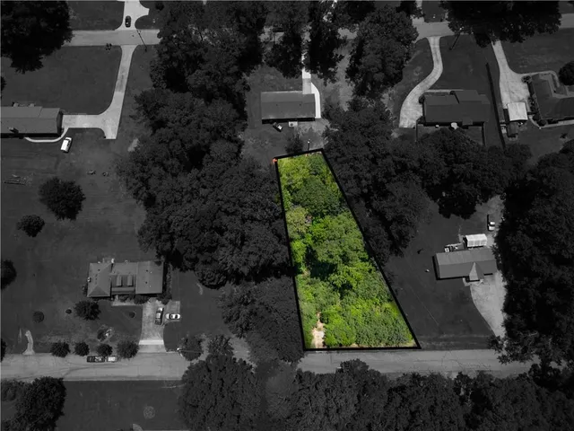 an aerial view of house with yard