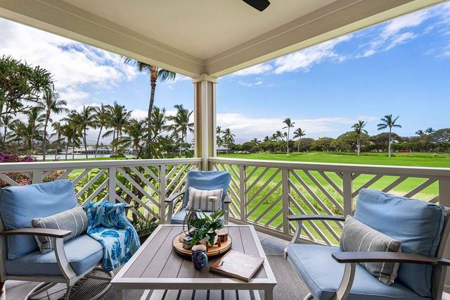 a view of a chairs and table in patio
