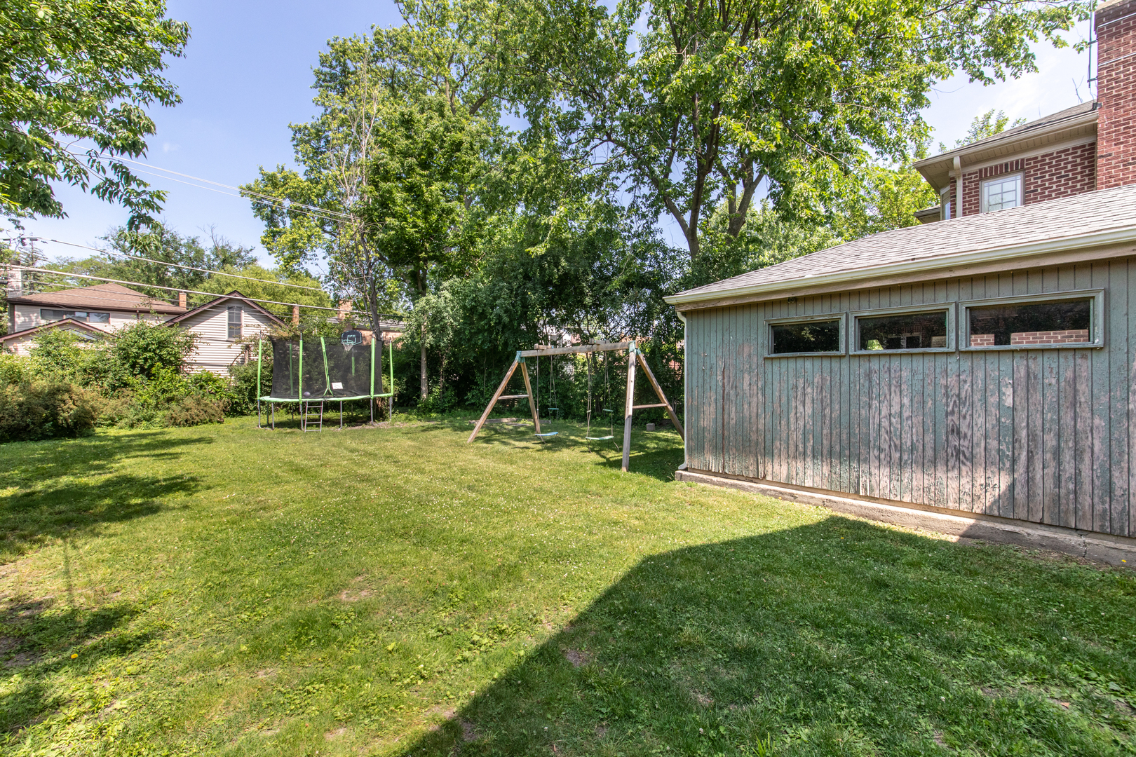 516 Engel Boulevard Park Ridge, IL 60068 - Photo 17 of 51 a backyard of a house with a table and chair