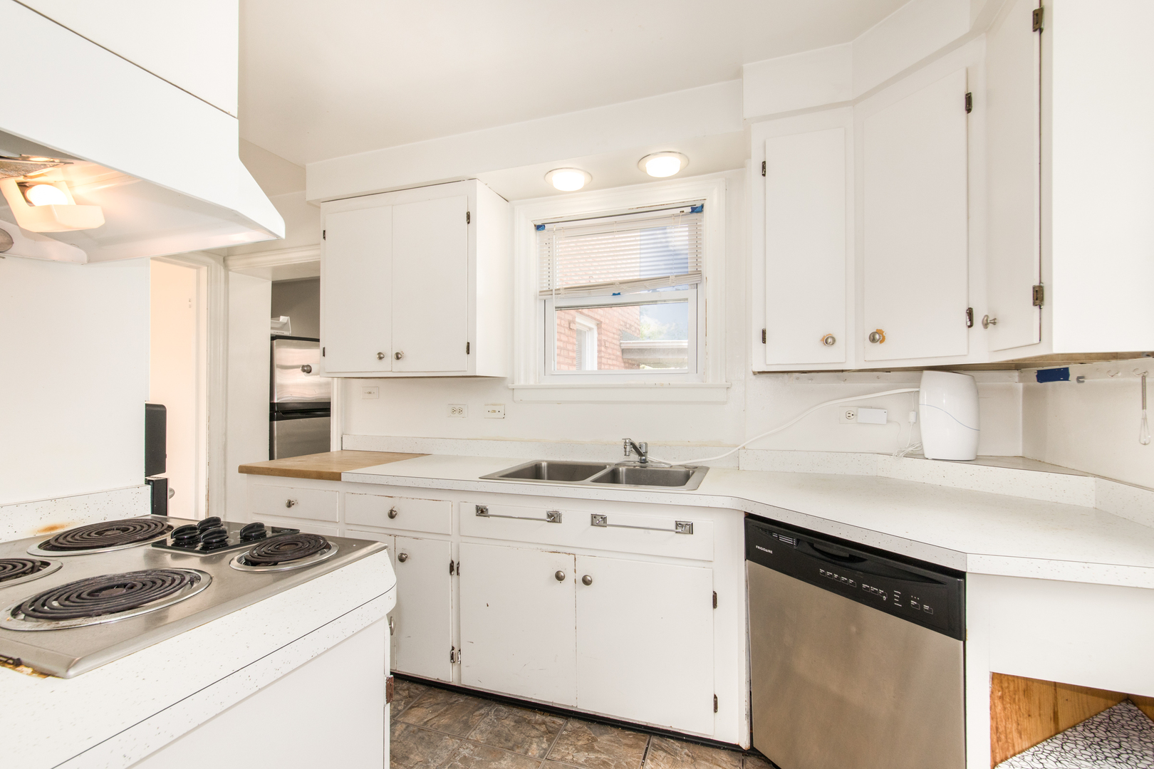 516 Engel Boulevard Park Ridge, IL 60068 - Photo 32 of 51 a kitchen with white cabinets and appliances