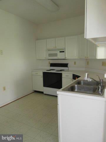 7206 Bogley Road, Unit 103 Baltimore, MD 21244 - Photo 7 of 12 Kitchen