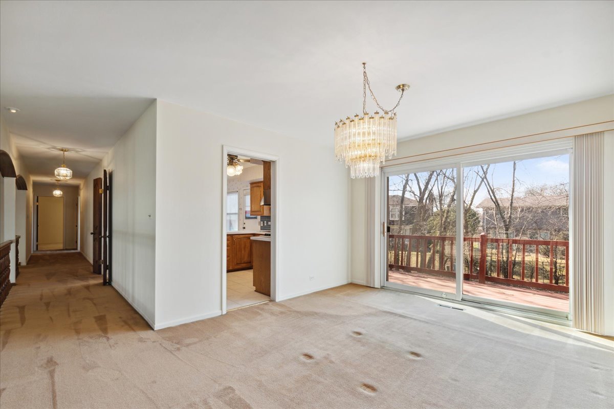 962 Suffield Terrace Northbrook, IL 60062 - Photo 6 of 33 a view of a room with large windows