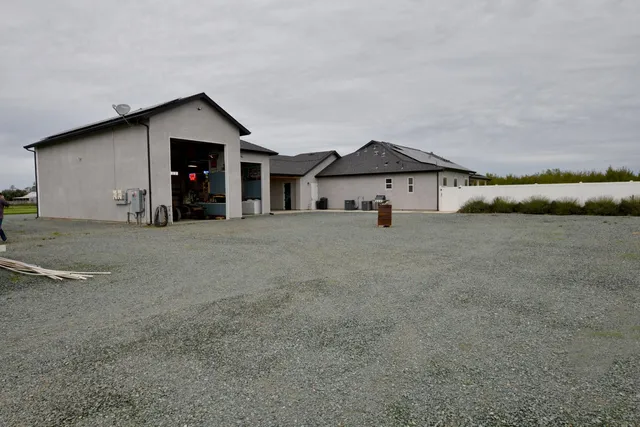 a view of a golf course with a garden