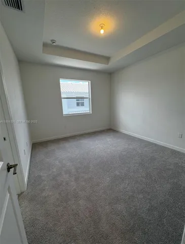 a bathroom with a double vanity sink a and mirror