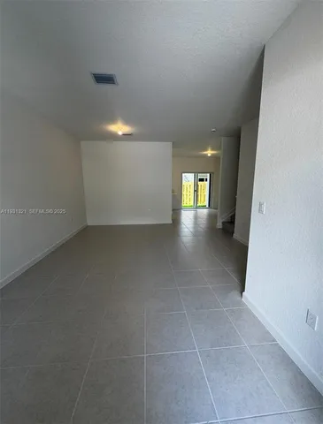 a bathroom with a sink toilet and mirror