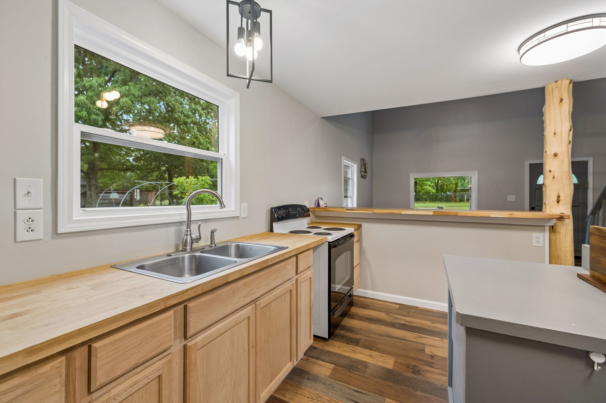 121 Hannah Road Summertown, TN 38483 - Photo 16 of 52 a kitchen with a sink and a window