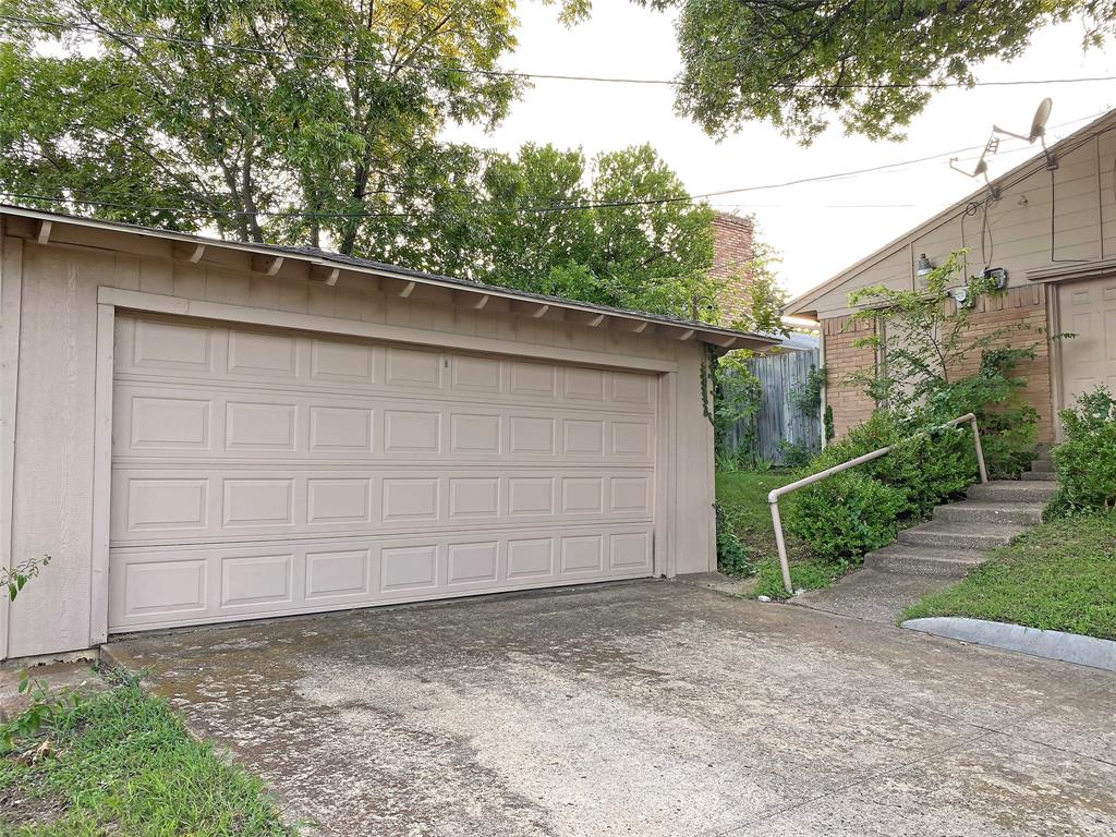 7406 Walling Lane Dallas, TX 75231 - Photo 15 of 15 a backyard of a house