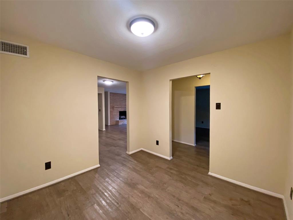 7406 Walling Lane Dallas, TX 75231 - Photo 7 of 15 wooden floor in an empty room