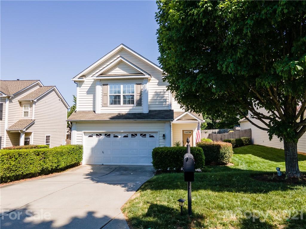2318 Mirage Place Fort Mill, SC 29708 - Photo 2 of 27 a front view of a house with a yard and garage