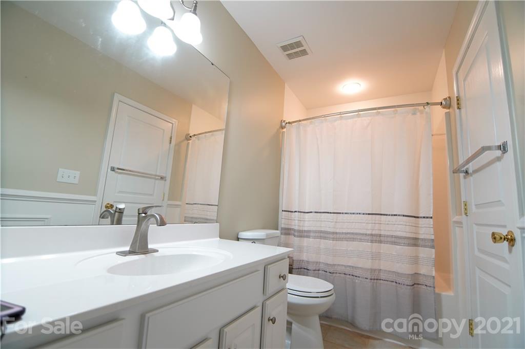 2318 Mirage Place Fort Mill, SC 29708 - Photo 21 of 27 a bathroom with a sink toilet and shower