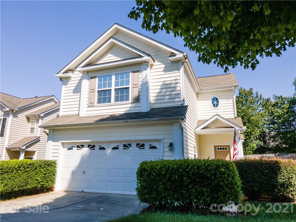 2318 Mirage Place Fort Mill, SC 29708 - Photo 5 of 27 a front view of a house with a garden