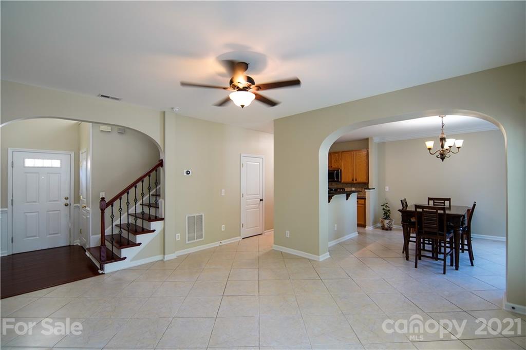 2318 Mirage Place Fort Mill, SC 29708 - Photo 9 of 27 a view of a livingroom with furniture and a ceiling fan
