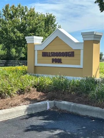 a sign on the side of the road