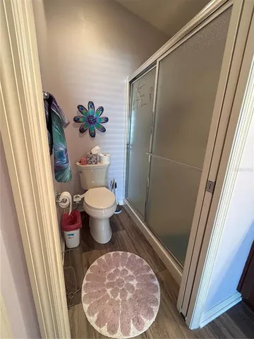 a bathroom with a toilet and a sink