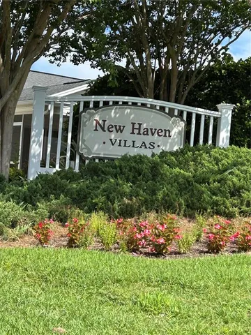 a view of a house with a garden