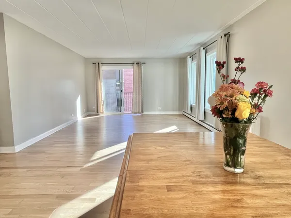 a view of hall with wooden floor