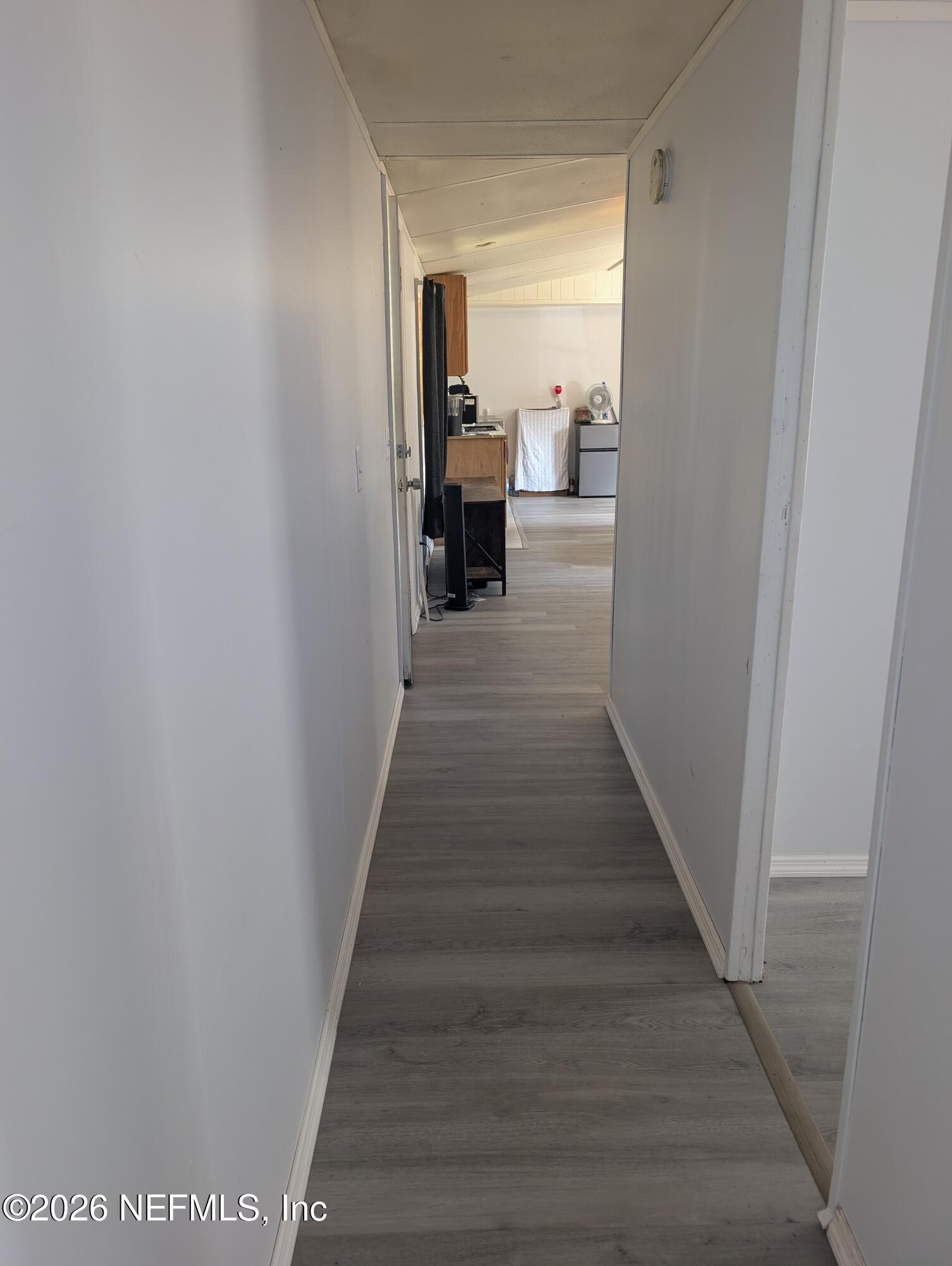114 Durden Road Interlachen, FL 32148 - Photo 11 of 30 a view of a hallway with wooden floor and entryway