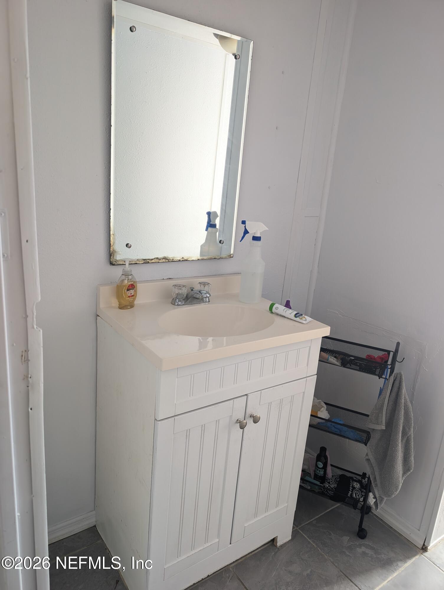 114 Durden Road Interlachen, FL 32148 - Photo 14 of 30 a bathroom with a sink and a vanity