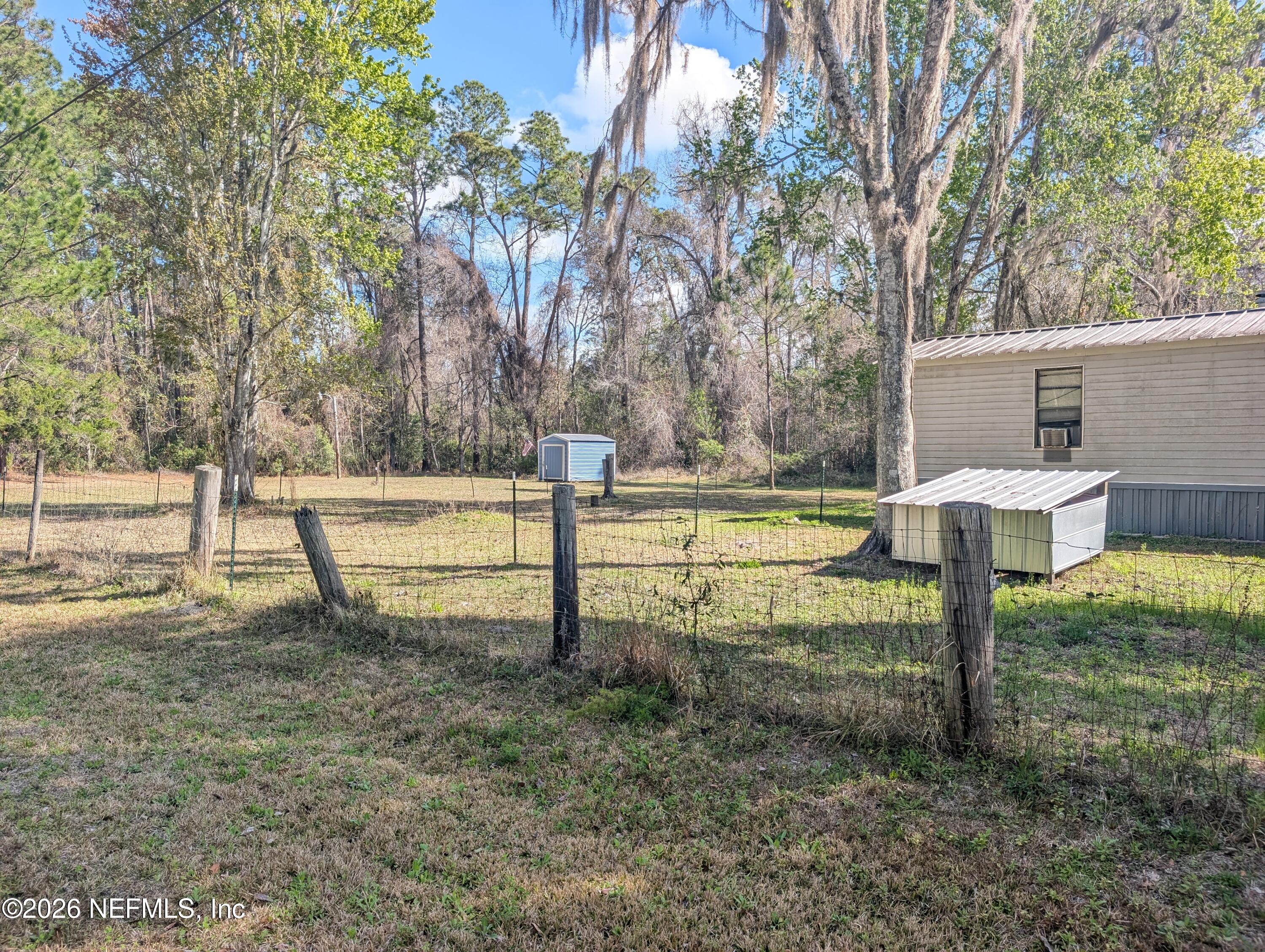 114 Durden Road Interlachen, FL 32148 - Photo 18 of 30 a view of a park with slide