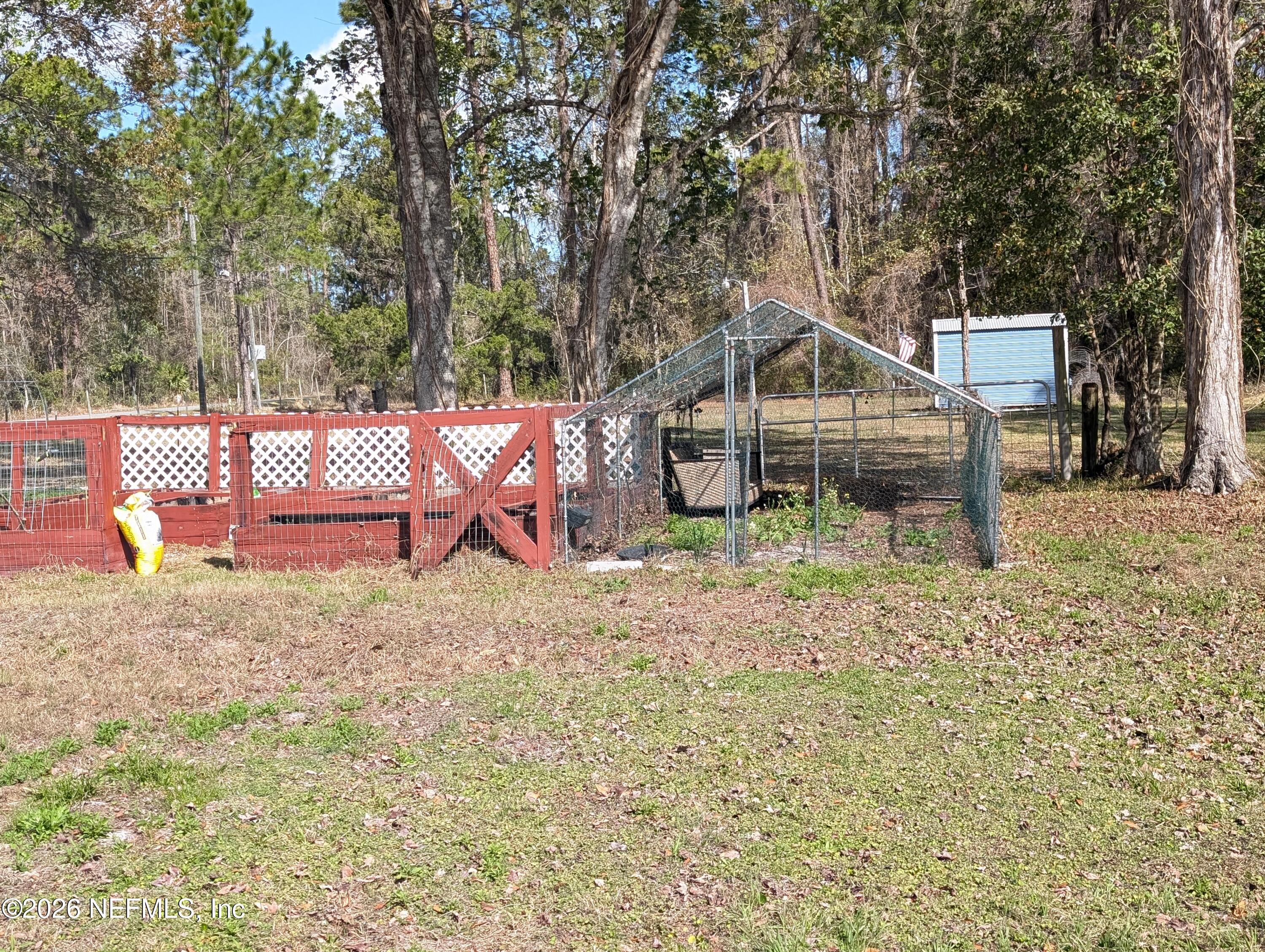 114 Durden Road Interlachen, FL 32148 - Photo 25 of 30 a front view of a house with a yard