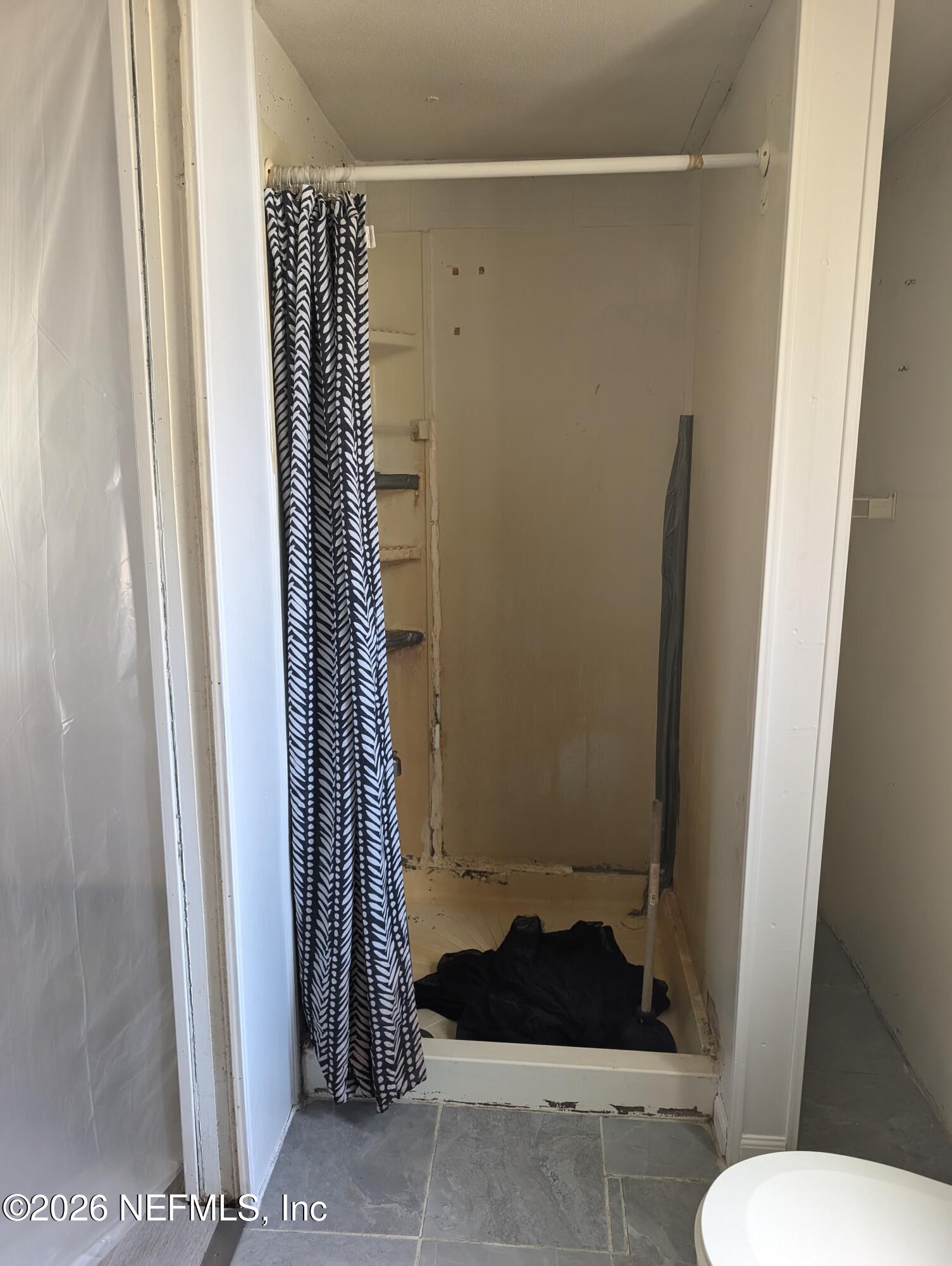 114 Durden Road Interlachen, FL 32148 - Photo 10 of 30 a bathroom with a shower and toilet