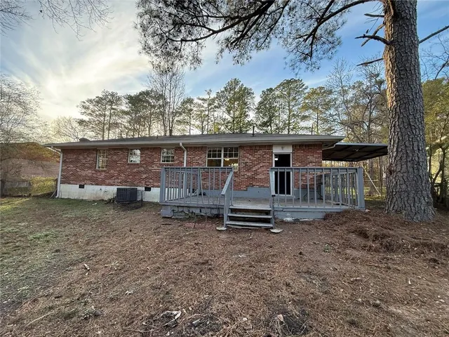 front view of a house with a tiny house