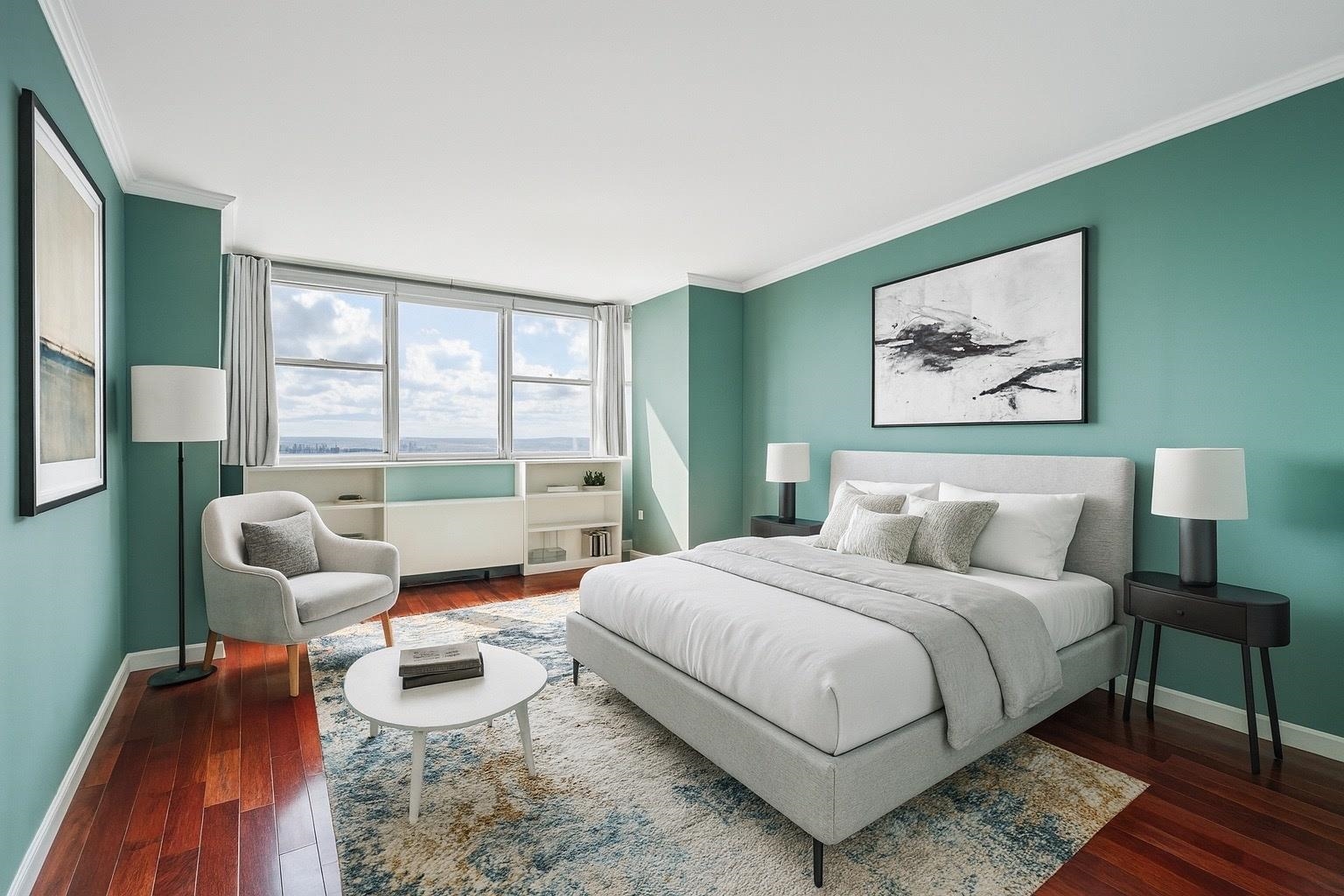 6040 Boulevard East, Unit 23G West New York, NJ 07093 - Photo 16 of 32 a bedroom with a bed and a large window