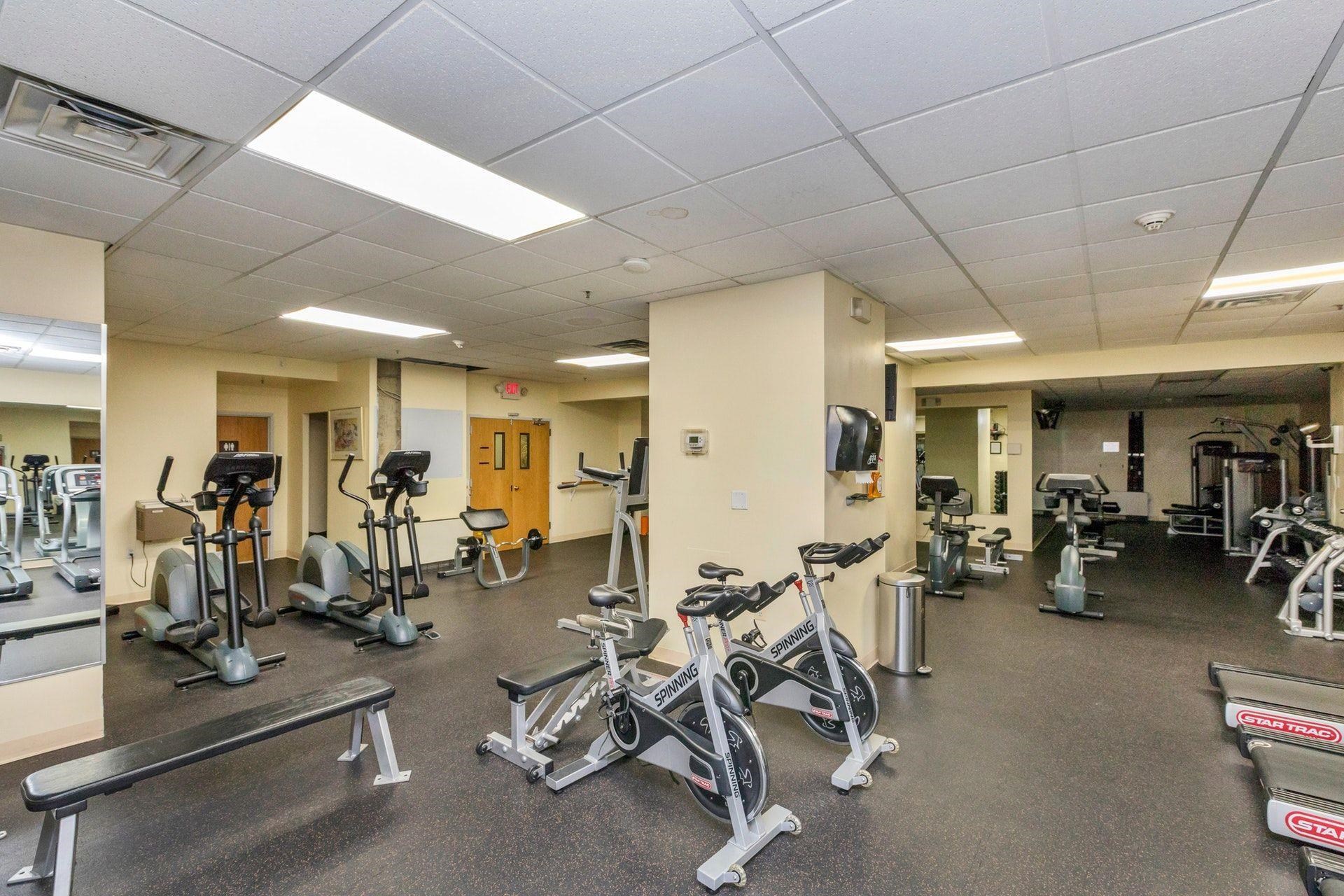 6040 Boulevard East, Unit 23G West New York, NJ 07093 - Photo 28 of 32 a view of a room with gym equipment