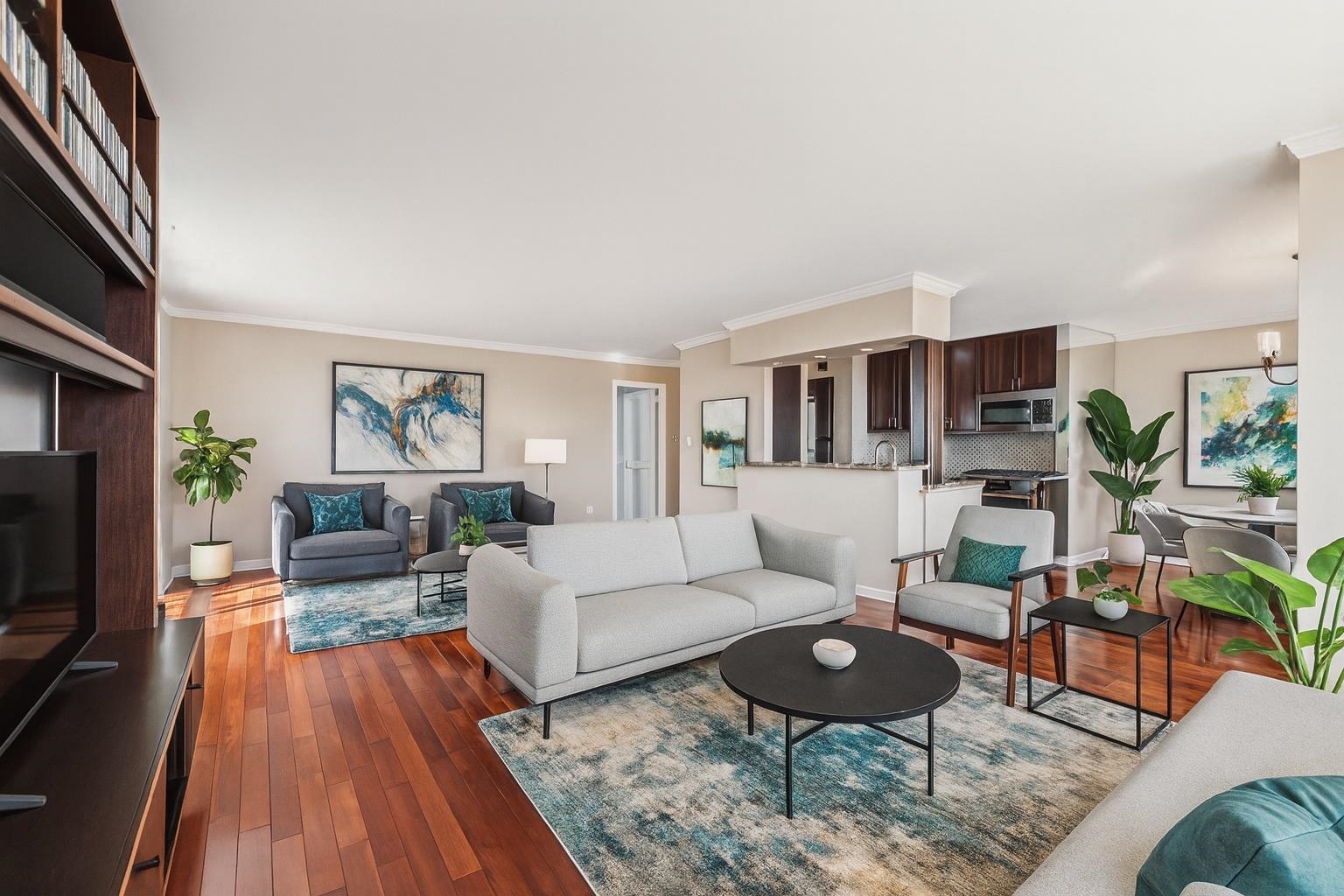 6040 Boulevard East, Unit 23G West New York, NJ 07093 - Photo 7 of 32 a living room with furniture and a wooden floor