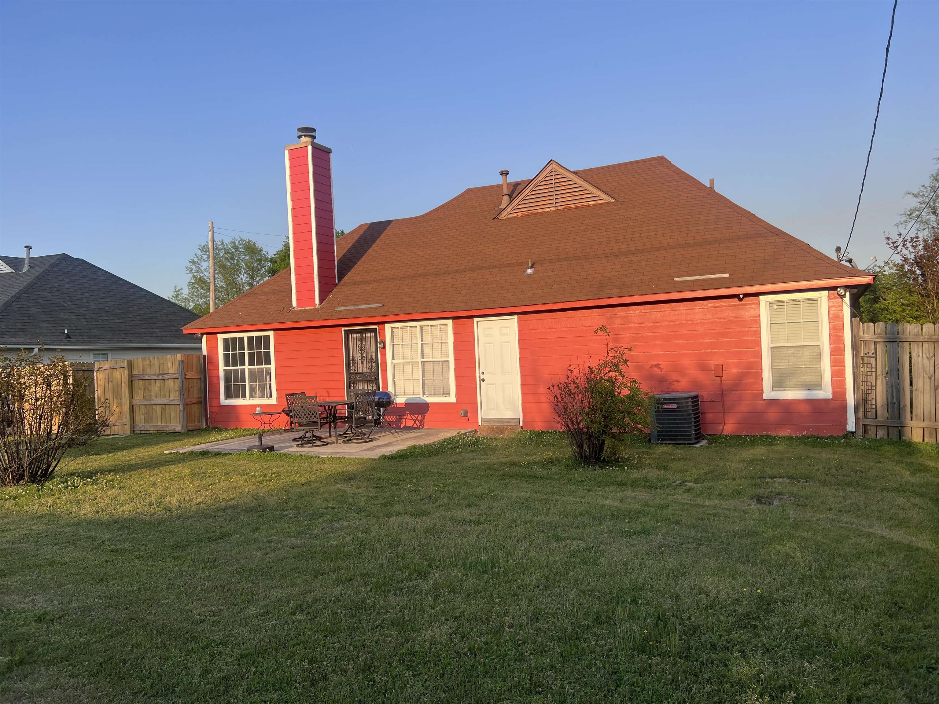 4005 Long Creek Road Memphis, TN 38125 - Photo 34 of 37 Rear view of property with a fenced backyard, a patio area, a chimney, and a shingled roof
