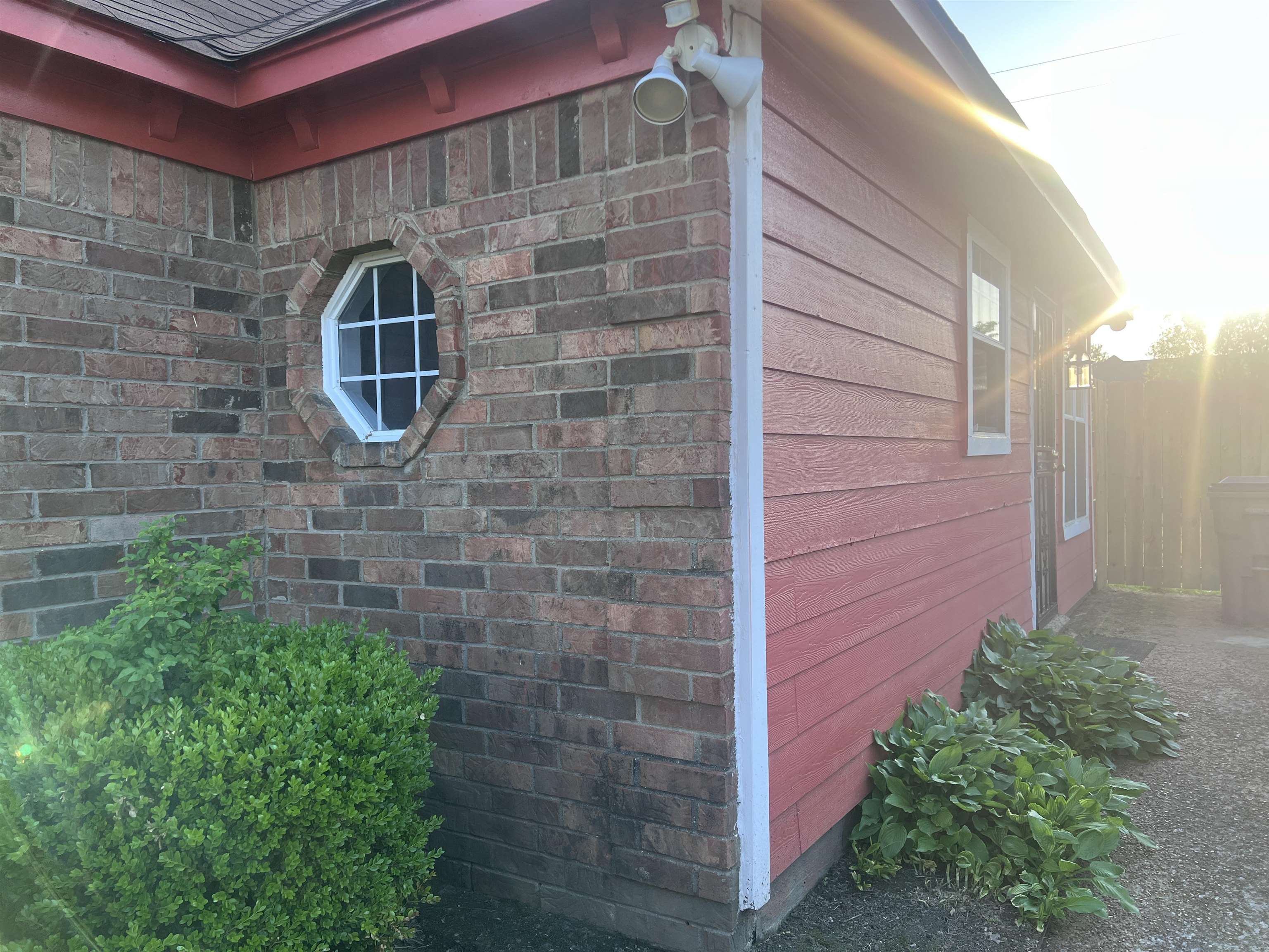 4005 Long Creek Road Memphis, TN 38125 - Photo 6 of 37 View of property exterior featuring brick siding