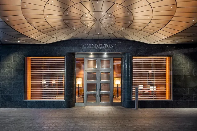 a view of a room that has a large window