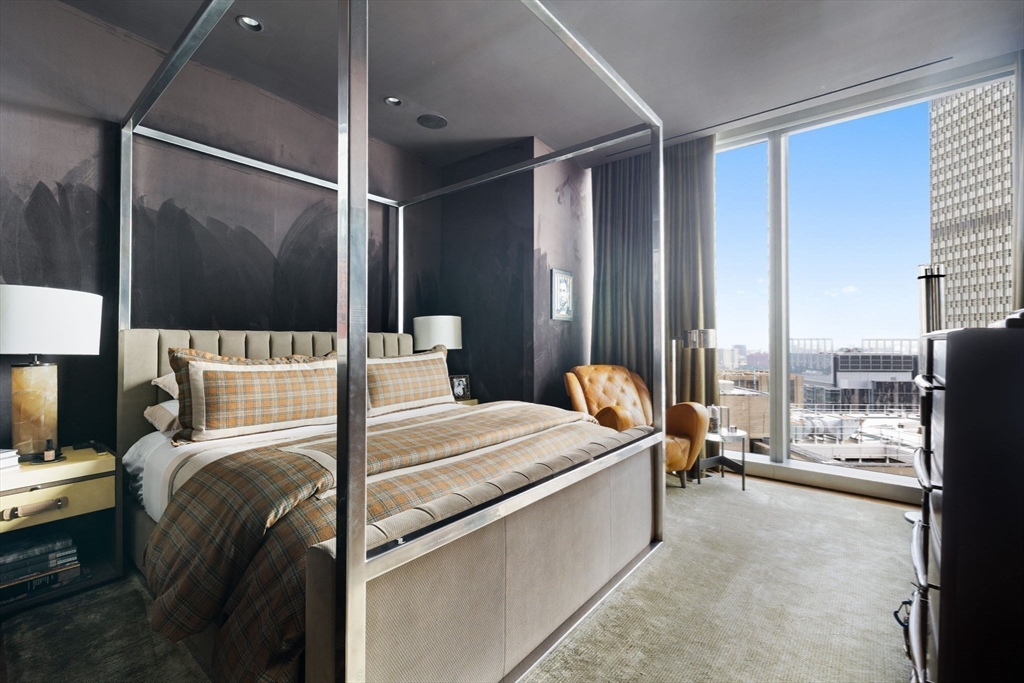 1 Dalton Street, Unit 3003 Boston, MA 02115 - Photo 10 of 24 a bed room with a bed and large window