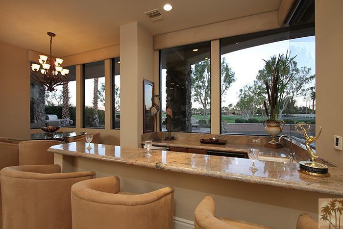 57990 Troon La Quinta, CA 92253 - Photo 11 of 30 a room with furniture and a large window