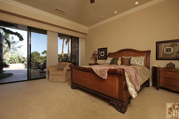 57990 Troon La Quinta, CA 92253 - Photo 13 of 30 a bed room with a bed and a couch