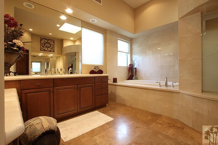 57990 Troon La Quinta, CA 92253 - Photo 15 of 30 a large bathroom with a large tub sink and vanity