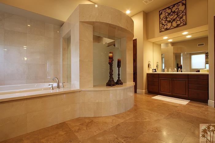 57990 Troon La Quinta, CA 92253 - Photo 16 of 30 a bathroom with a tub sink and mirror