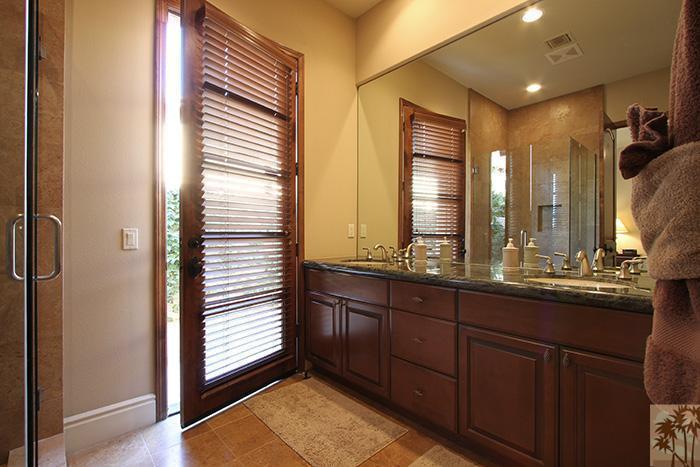 57990 Troon La Quinta, CA 92253 - Photo 24 of 30 a bathroom with a double vanity sink and a mirror