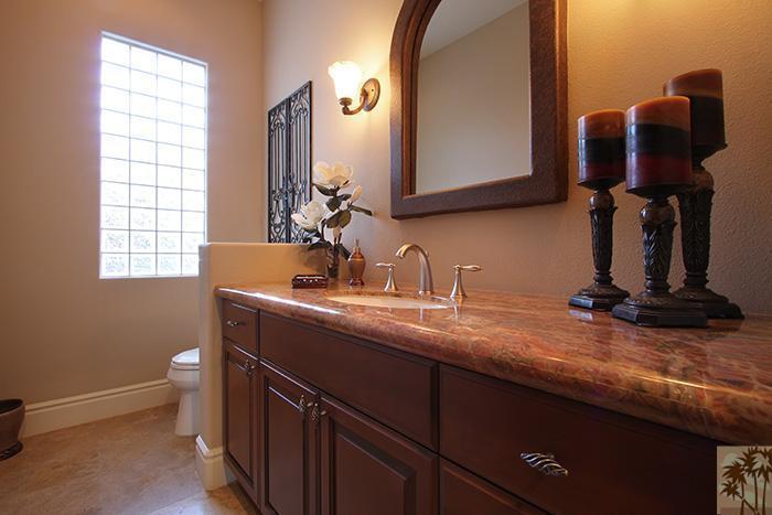 57990 Troon La Quinta, CA 92253 - Photo 25 of 30 a bathroom with a sink and a mirror