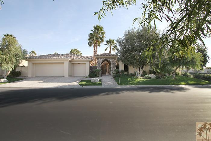 57990 Troon La Quinta, CA 92253 - Photo 29 of 30 a front view of a house with a garden and tree