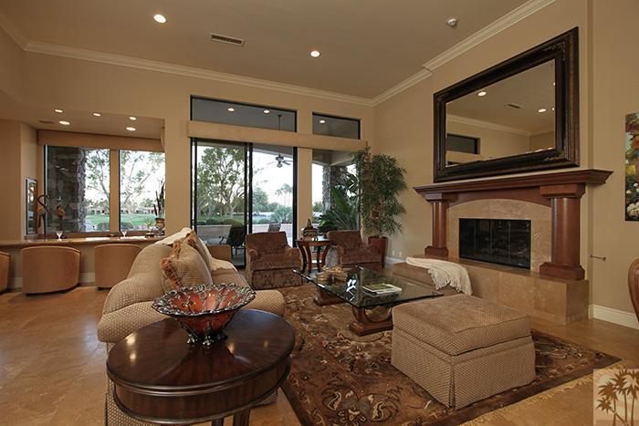 57990 Troon La Quinta, CA 92253 - Photo 3 of 30 a living room with furniture and a fireplace