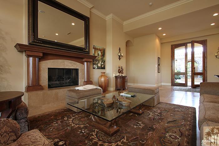 57990 Troon La Quinta, CA 92253 - Photo 4 of 30 a living room with furniture and a fireplace