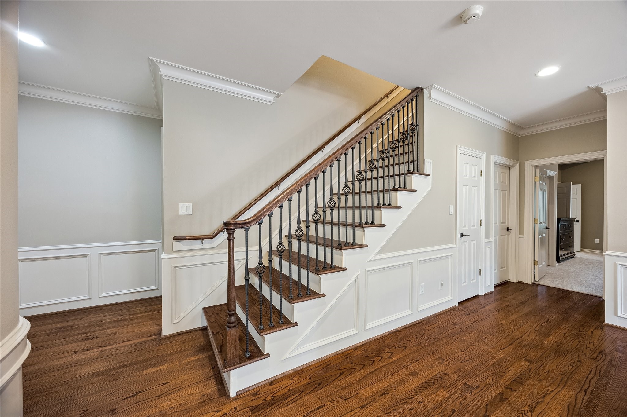 6358 Auden Street Houston, TX 77005 - Photo 32 of 50 a view of entryway and hall with wooden floor