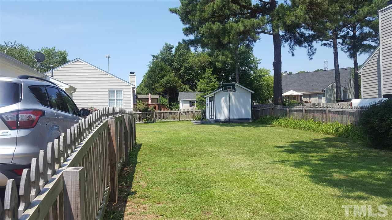 9300 Dawnshire Road Raleigh, NC 27615 - Photo 22 of 25 a house view with a garden space