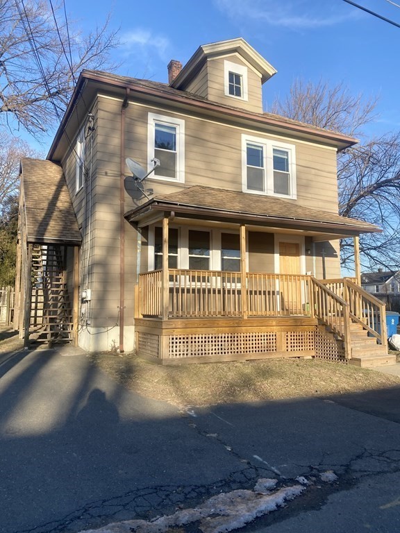 56 Exposition Terrace West Springfield, MA 01089 - Photo 2 of 16 a front view of a house with a yard